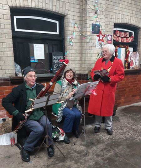 Deputy mayor with some of the musicians